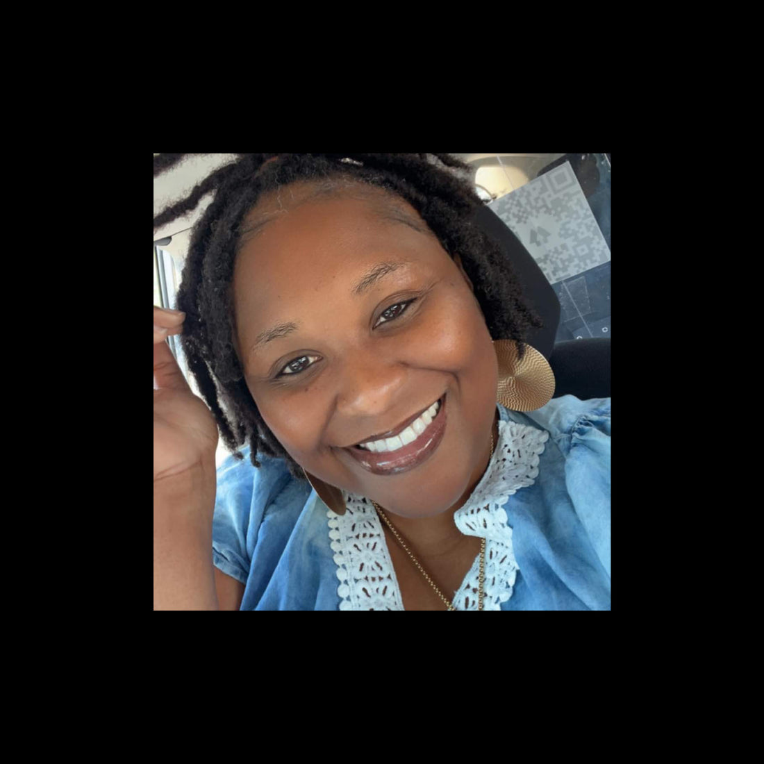 Malkia Janae- Owner of Hashtag BYOB Clothing